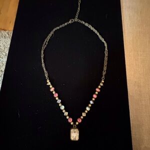 Avon Vintage Colored stone Necklace. The chain has tarnished was gold tone.